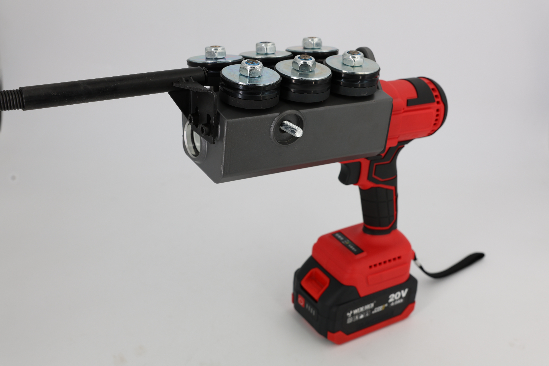 WOERDI 1025TM-01 20V cordless cable threading machine with six-roller drive head and 20V battery